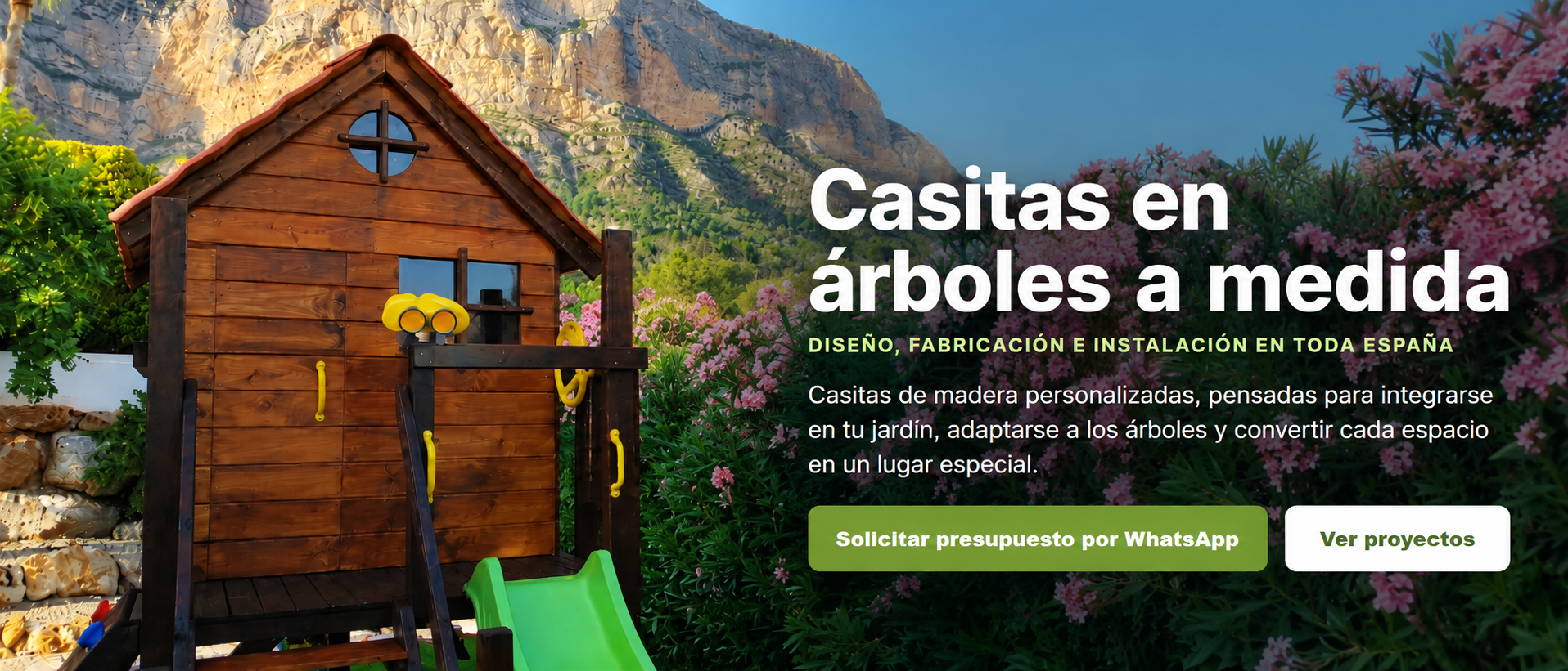 Casita infantil de madera junto a flores rosas y montañas. Diseño, fabricación e instalación en toda España.